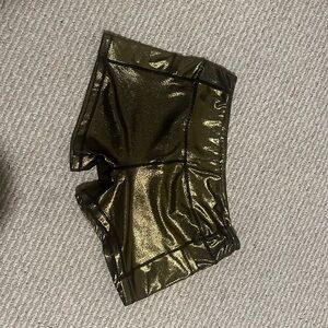 Born Primitive, sparkly gold booty shorts with pockets